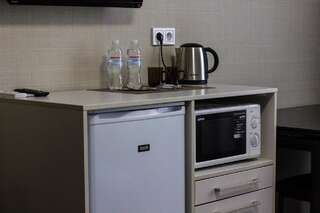 Апартаменты Solo Apartment Ahmatovoy Киев Улучшенный номер с диваном-6